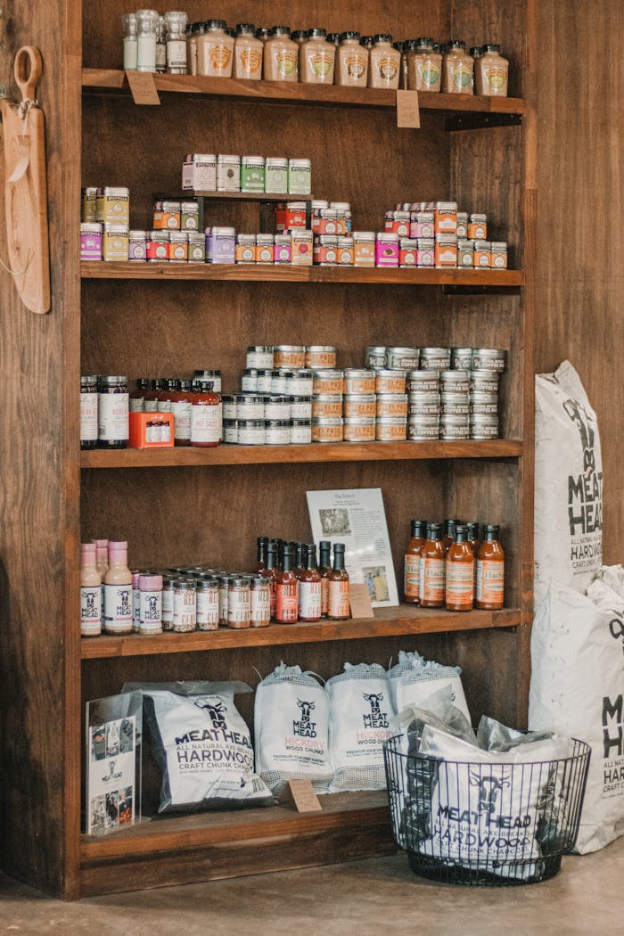 Services-01 A rustic wooden shelf displaying local meat and condiments at a South Carolina butcher shop.